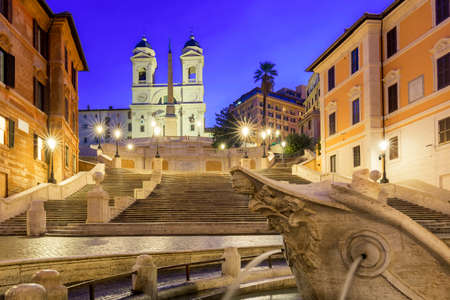 Spanish Steps, Piazza di Spagna, Fountain della Barcaccia and Trinita dei Monti church during morning sunrise in Rome, Italyの写真素材