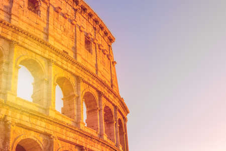 Colosseum at sunset in Rome, Italy. World famous landmark in Italyの写真素材