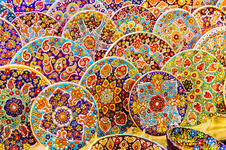 Traditional arabic colorful ceramic plates at Dubai Market souk, United Arab Emiratesの写真素材