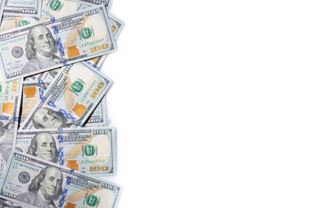 One hundred dollar pile as a finance background free free space isolated on white background.の写真素材