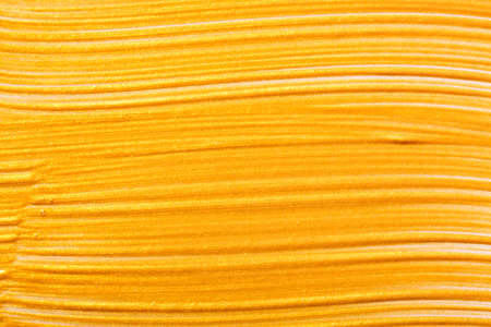 Yellow gold brush stroke background. Colorful watercolor brush stroke pattern