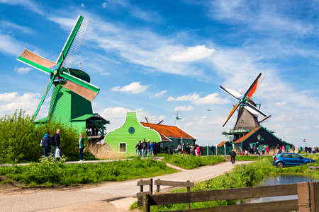Zaandam, Zaanse Schans, The Netherlands - May, 2018: Zaanse Schans village with tourists near...