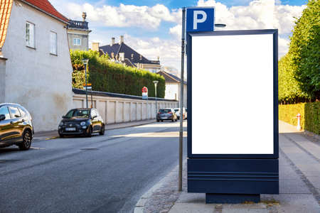 Modern empty blank advertising billboard banner in a city outdoors at a bus station. Mockup for your advertising projectの写真素材