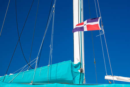Tourism concept. Dominican Republic flag on the tourist boatの写真素材