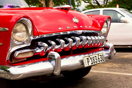 Havana, Cuba - November, 2018: Colorful vintage classic American cars parked on the street of Old...