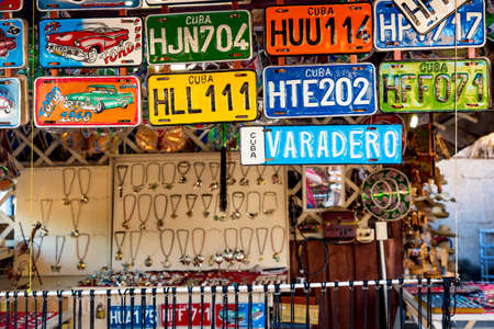 Varadero, Cuba - November, 2018: Car license plates for sale in Varadero at souvenir market. Car license plates are popular souvenirs.のeditorial素材