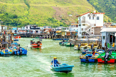 Lantau, Hong Kong, SAR of China - may, 2019: Old houses standing in the water in fishing village Tai O, Lantau, Hong Kong, SAR of Chinaのeditorial素材