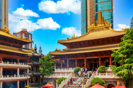 Shanghai, China - May, 2019: Interior of famous buddhist Jing An Temple in Shanghai, China. Sunny day.のeditorial素材