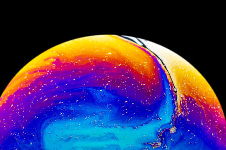 Soap bubble close up macro abstraction and planet imitation. Abstract background with colorful...