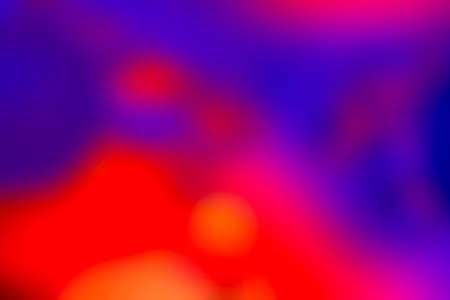 Blurred background in vibrant neon colors. Multicolored blurry abstract colorful texture pattern for design.の写真素材