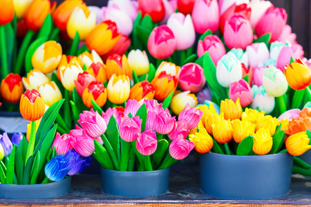 Colorful artificial tulips in flower pots. Souvenirs in Netherlands.の写真素材