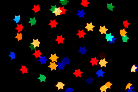 Colorful stars abstract background. Glowing stars lights on black background.