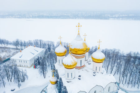 Aerial drone view of the Orthodox Assumption Cathedral during winter in Yaroslavl, Russia. Ancient touristic city of the Golden Ringの素材 [FY310162461023]