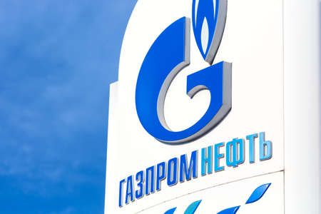 Moscow, Russia - February, 2021: Gazpromneft signboard on the gas station against blue sky.のeditorial素材
