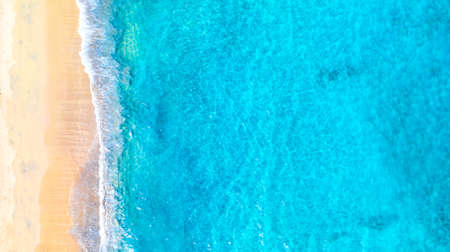 Aerial drone image of beautiful paradise Maldives tropical beach. Ocean seashore with beautiful...