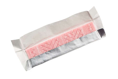 Pink chewing gum in wrapping paper foil isolated on white background