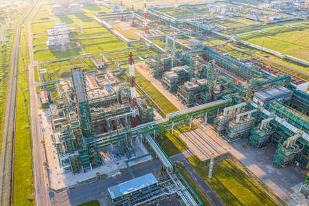 Aerial drone view of petrol industrial zone or oil refinery in Yaroslavl, Russia during sunset time.の写真素材