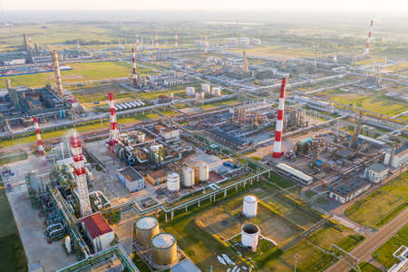 Aerial drone view of petrol industrial zone or oil refinery in Yaroslavl, Russia during sunset time.の写真素材