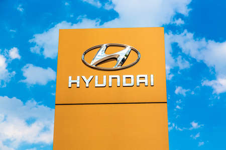 Moscow, Russia - August, 2021: Hyundai automobile dealership Sign against blue sky. Hyundai Kia is a South Korean manufacturer of automobiles and commercial vehiclesのeditorial素材