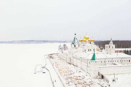 Aerial drone view of the Orthodox Holy Trinity Ipatievsky monastery during winter in Kostroma, Russia. Ancient touristic city of the Golden Ringの写真素材