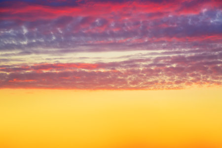 Beautiful sunset sky abstract background. Sky with red pink clouds. Nature backgroundの写真素材