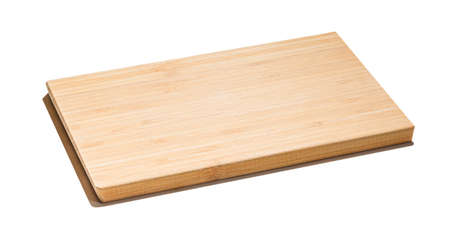 New rectangular wooden bamboo cutting board isolated on white background. Full depth of field. Mockup for food projectの写真素材
