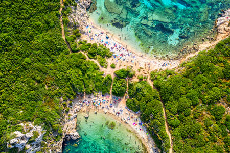 Corfu Island iconic image. Aerial drone view of Porto Timoni beach in Corfu. Ionian sea, Greeceの写真素材