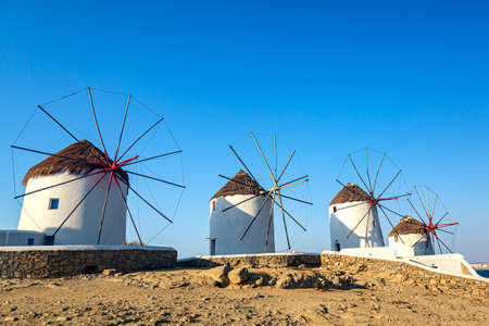Iconic picture of Mykonos. Famous windmills of Mykonos Island, Greeceの写真素材