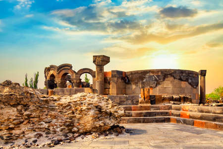 Famous landmark in Armenia. The ruins of the ancient medieval temple of Zvartnots, Armenia during amazing sunset.のeditorial素材