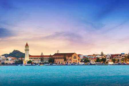 Evening sunset panorama of town hall and Saint Dionysios Church in Zakynthos city. Ionian Sea, Zakynthos island, Greece, Europeのeditorial素材
