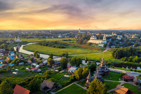 Aerial drone view of Suzdal Kremlin and cathedral of Nativity with Museum of Wooden Architecture at the Kamenka river, Russia. Summer sunny day sunset.のeditorial素材