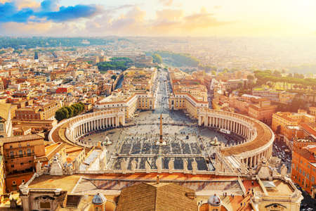 Famous Saint Peter's Square in Vatican and aerial view of the Rome city during sunny day sunset.のeditorial素材