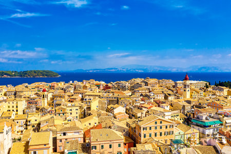 Aerial drone view of Kerkyra city with colorful houses during summer sunny day. Corfu island, Greeceの写真素材
