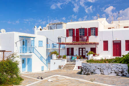 Famous old town narrow street with white houses. Mykonos island, Greece.の写真素材