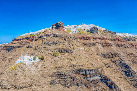 The Chapel of Panagia Theoskepasti with Aegean sea. Skaros rock, Imerovigli, Santorini island, Greeceの写真素材