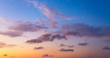 Beautiful sunset sky abstract background. Sky with purple pink clouds. Nature backgroundの写真素材