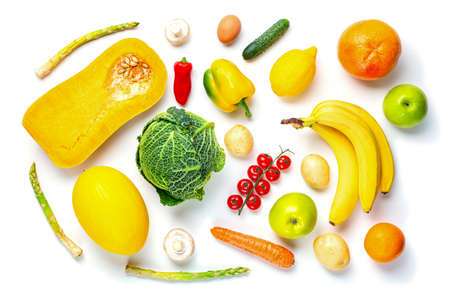 Vegetarian healthy food concept. Vegetables, fruits assortment isolated on white background. Food and grocery shopping. Top view.の写真素材