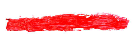 Close up of red lipstick smudge or smear isolated on white background.の写真素材