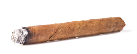 Burning brown cuban cigar isolated on white background.