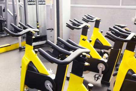 modern fitness gym. Sports gym or fitness bike equipment.の写真素材