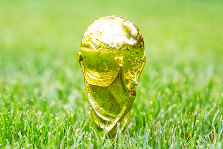 Moscow, Russia - July, 2022: FIFA World Cup Trophy in football grass lawn.のeditorial素材