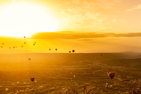 Silhouettes of hot air balloons at sunset sky. Goreme National Park in Cappadocia, Turkeyの写真素材