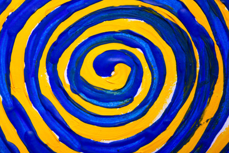 Abstract colorful brush strokes as a spiral background. Abstract painted art background