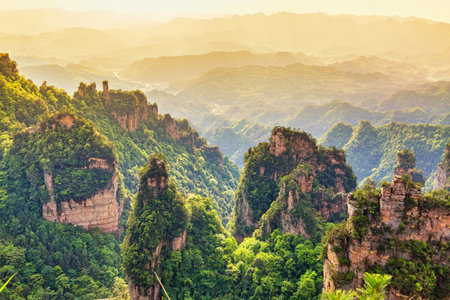 Zhangjiajie National park. Famous tourist attraction in Wulingyuan, Hunan, China. Amazing natural landscape with stone pillars quartz mountains during sunset.の写真素材