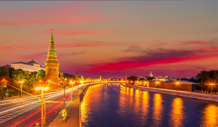 Moscow quay view with Kremlin wall tower during colorful summer sunset in the evening. Famous Moscow Landmark in Russia.の写真素材