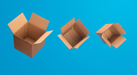 Delivery and shipping concept. Three levitating flying opened cardboard boxes against blue...
