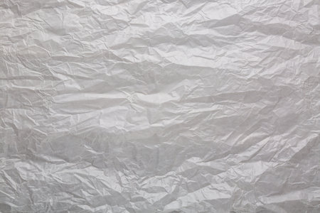 Abstract gray recycled crumpled paper for background. Wrinkled craft paper texture background.の写真素材