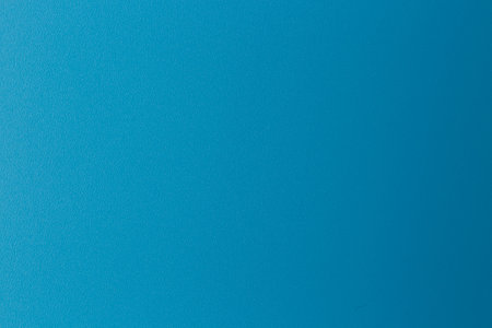 Blue paper sheet fabric texture. Blue canvas cardboard texture as a background. Blue plastic photographic background.の写真素材