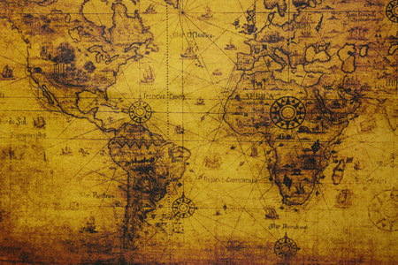 Old geographical vintage map of the world. Ancient world map atlas on canvas. Old travel background.の写真素材