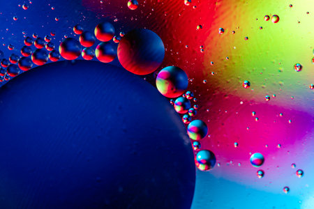 Space or planets universe cosmic abstract blue yellow background. Abstract molecule atom structure. Water bubbles. Macro shot of air or molecule. Biology, physics or chemistry abstract backgroundの写真素材